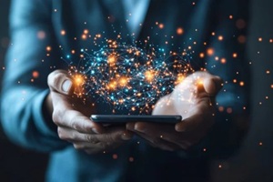 a person holding a mobile phone with digital particles emitting