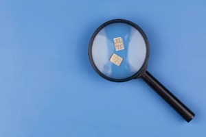 two phone SIM cards, symbolizing international communication, dual SIM convenience, and staying connected abroad